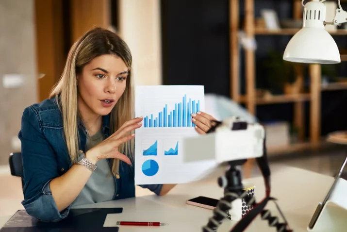 Creator presenting social media marketing performance charts