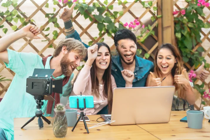 Group of video content creators celebrating their production